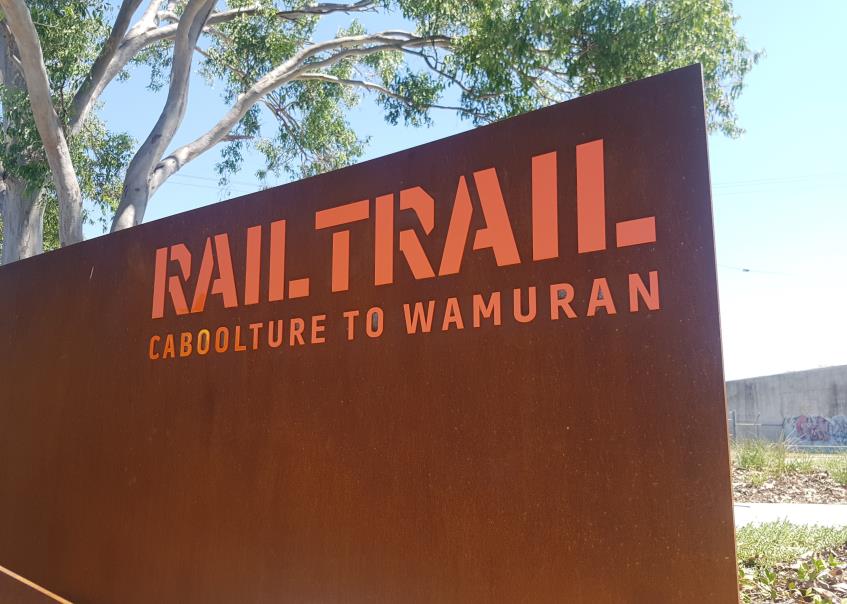 Caboolture to Wamuran Rail Trail sign on wall